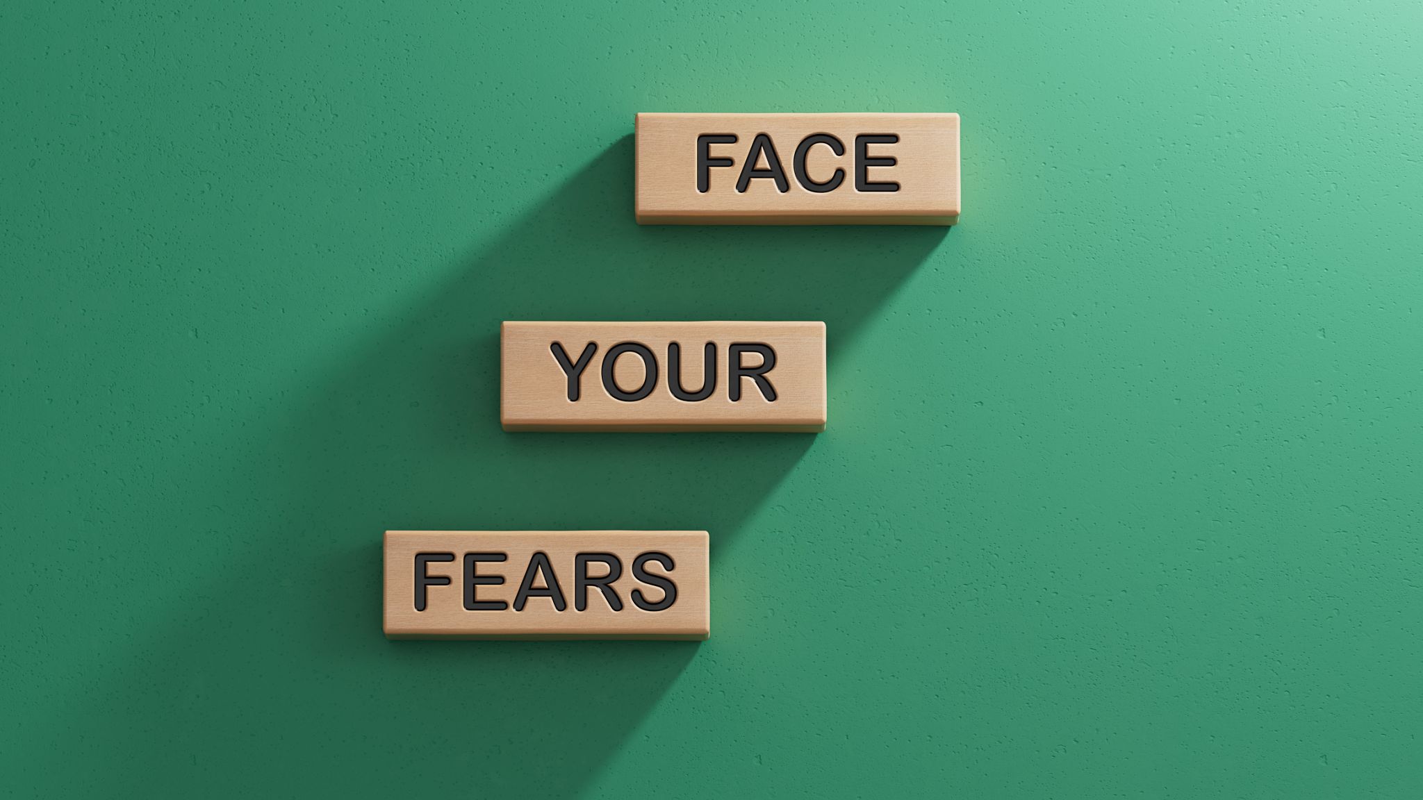 Face your Fears symbol. Wooden blocks with words Face your Fears.Business and Face your Fears. Copy space.3D rendering on green background. Face your Fears symbol. Wooden blocks with words Face your Fears.Business and Face your Fears. Copy space.3D rendering on green background.