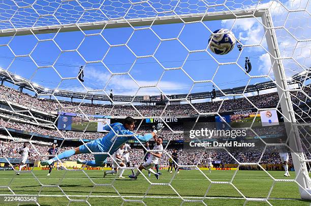 Goncalo Ramos of Paris Saint-Germain scores his team's fourth goal past Dani Carvajal and Thibaut Courtois of Real Madrid C.F. During the FIFA Club...