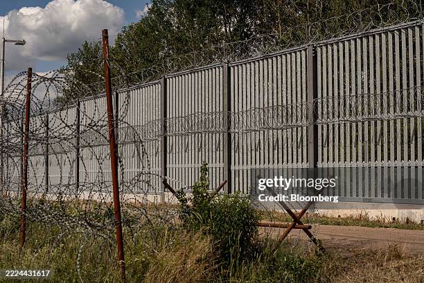 The Polish-Belarus border fence near the village of Ozierany Male, Poland, on Friday, Jul. 4, 2025. Polish Deputy Defense Minister Pawel Bejda and...
