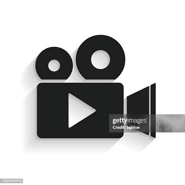 videokamera. symbol mit langem schatten auf weißem hintergrund - filmkamera stock-grafiken, -clipart, -cartoons und -symbole