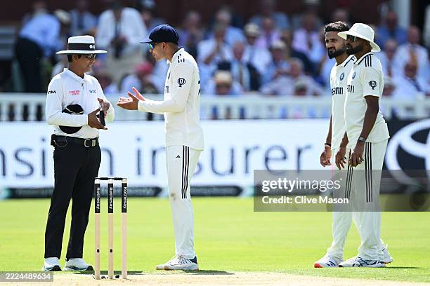 Shubman Gill of India talks with Umpire Sharfuddoula about an issue with the ball during Day One of the 3rd Rothesay Test Match between England and...