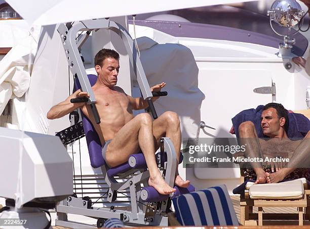 Jean-Claude Van Damme exercising on his yacht during the 54th Cannes Film Festival in Cannes, France. Van Damme is in Cannes to promote his new film...
