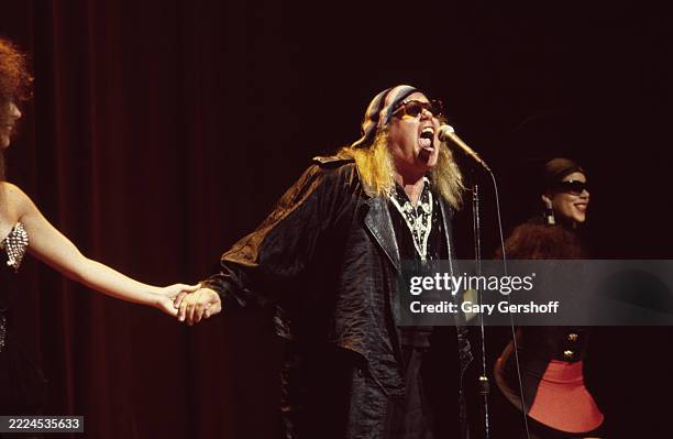 American comedian Sam Kinison performs onstage at the Beacon Theater, New York, New York, August 4, 1988.