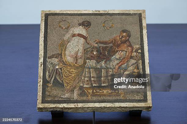 The Roman-era mosaic depicting a pair of lovers displayed at the the Auditorium, returned to the Archaeological Park of Pompeii and repatriated from...