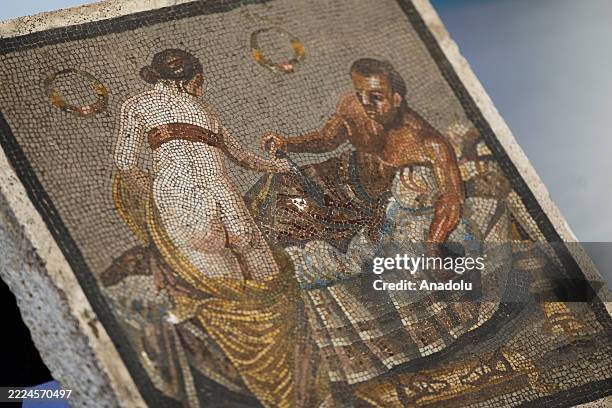 The Roman-era mosaic depicting a pair of lovers displayed at the the Auditorium, returned to the Archaeological Park of Pompeii and repatriated from...