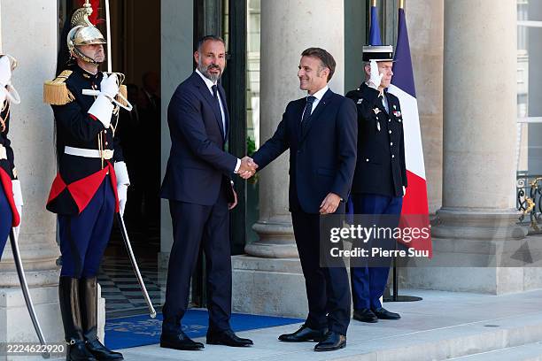France's President Emmanuel Macron welcomes Prince Rahim al-Hussaini, Aga Khan V, upon his arrival at the presidential Elysee Palace for a working...
