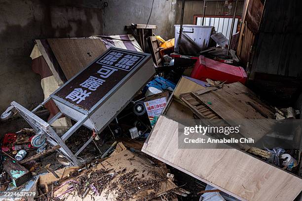 Damaged house after Typhoon Danas swept through Taiwan on July 11, 2025 in Tainan, Taiwan. Residents are still cleaning up four days after Typhoon...