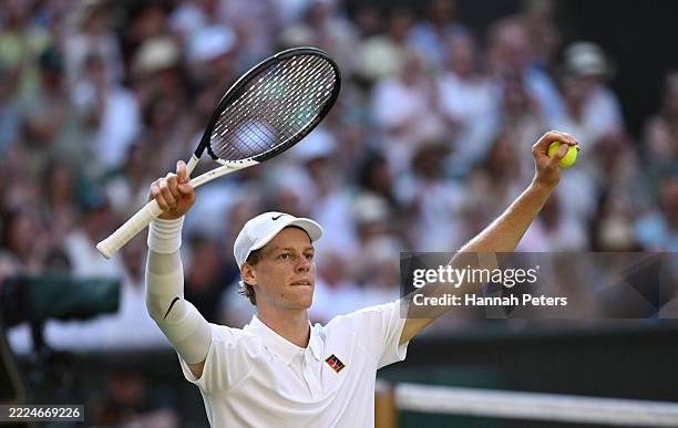 Jannik Sinner of Italy celebrates winning match point against Novak Djokovic of Serbia during the Gentlemen's Singles semi-final match on day twelve...