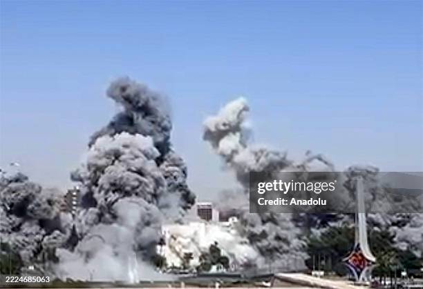 Smoke rises from the Syrian army's General Staff Complex after Israeli warplanes carried out multiple airstrikes in Damascus, Syria on July 16, 2025....