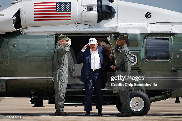 President Donald Trump arrives at Lackland Air Force Base to board Air Force One and return to Washington after visiting Kerrville, Texas where they...