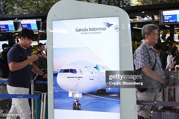 Signage for PT Garuda Indonesia at Soekarno-Hatta International Airport in Cengkareng, Indonesia, on Wednesday, July 16, 2025. Indonesia will buy...