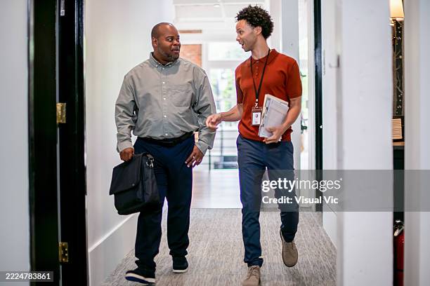 walking into office space - custom software development stock pictures, royalty-free photos & images