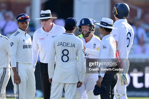 Ben Duckett of England speaks with Ravindra Jadeja of India as