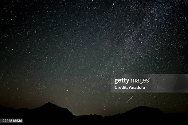 Meteors are seen streaking across the Milky Way in the night sky in Bonar, Spain on July, 17 2025. The annual meteor shower Perseids can be seen...