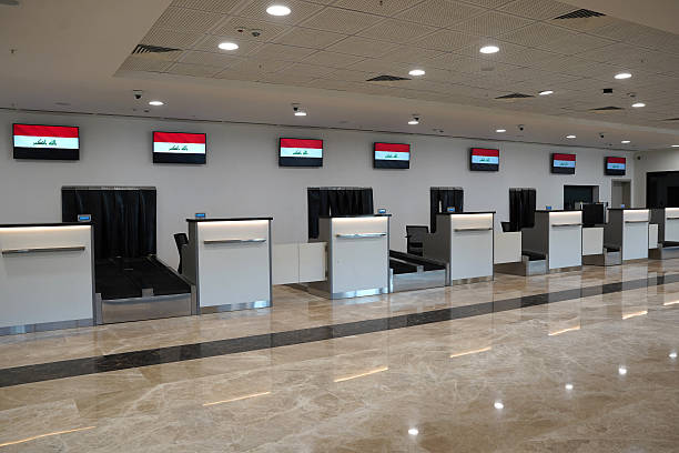 This picture shows check-in counters at the Mosul International Airport in northern Iraq before its official re-inauguration on July 16, 2025.