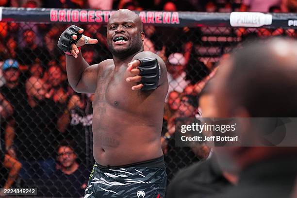 Derrick Lewis reacts after a knockout victory against Tallison Teixeira of Brazil in a heavyweight fight during the UFC Fight Night event at...