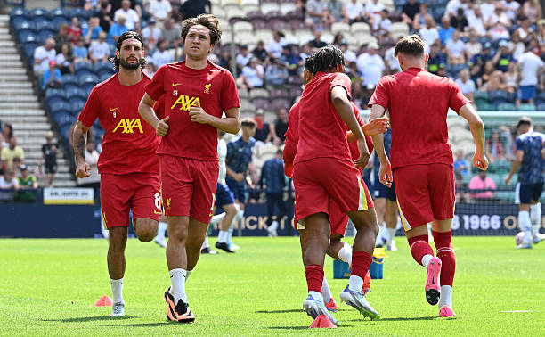 Federico Chiesa of Liverpool warms up with his teammates prior to the pre-season friendly match between Preston North End and Liverpool at Deepdale...