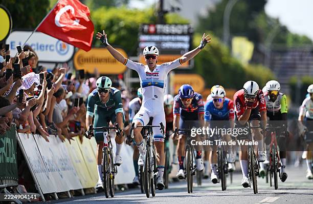 Tim Merlier of Belgium and Team Soudal Quick-Step celebrates at finish line as stage winner ahead of Jonathan Milan of Italy and Team Lidl - Trek -...