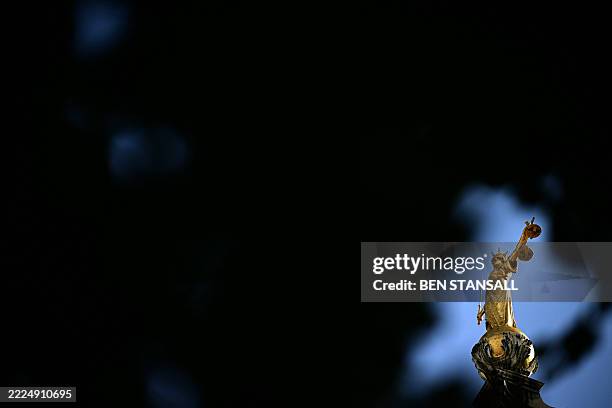 Statue of "Lady Justice", holding a sword and scales of justice, by sculptor F.W Pomeroy, is pictured atop of Britain's Central Criminal Court,...