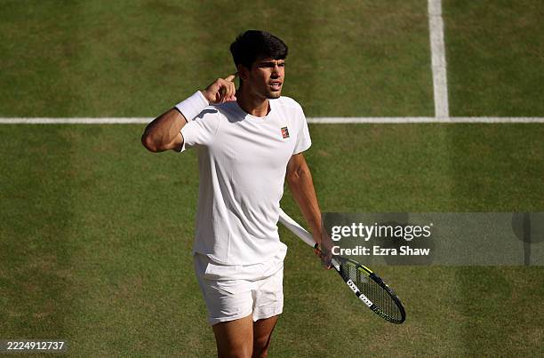 Carlos Alcaraz of Spain celebrates after winning the first set against Jannik Sinner of Italy during the Gentleman's Singles Final on day fourteen of...