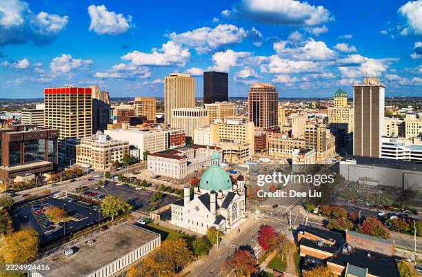 dayton, ohio downtown aerial with puffy clouds - dayton stock pictures, royalty-free photos & images