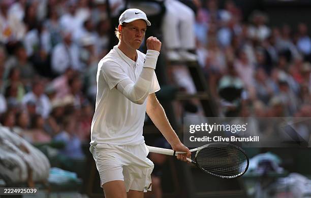 Jannik Sinner of Italy celebrates winning the third set against Carlos Alcaraz of Spain during the Gentleman's Singles Final on day fourteen of The...