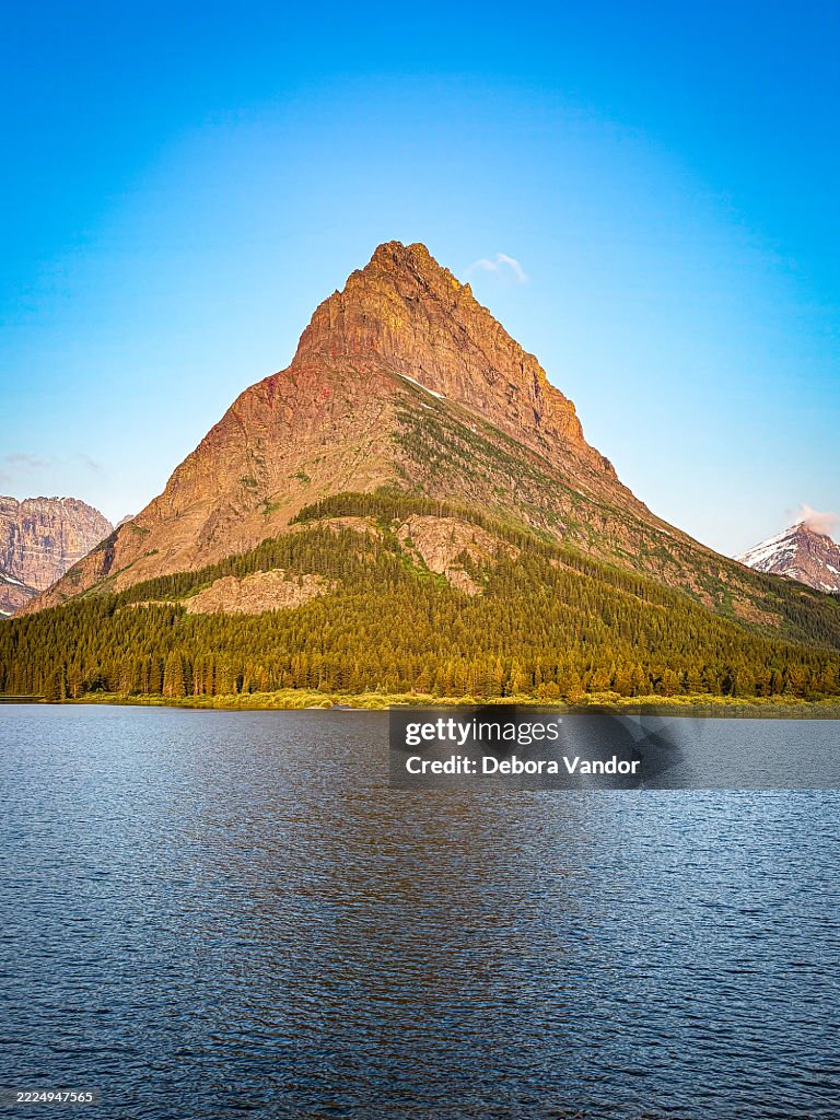 Golden hour at Swiftcurrent lake in Many Glaciers Montana