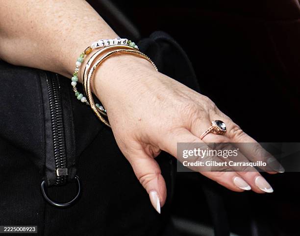 Actress/comedian Lisa Ann Walter, jewelry detail, is seen leaving her comedy show on July 13, 2025 in Philadelphia, Pennsylvania.