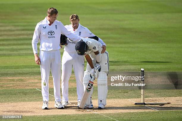 India batsman Mohammed Siraj is consoled by Zak Crawley and Joe Root after England had won by 22 runs during day five of the third test match between...