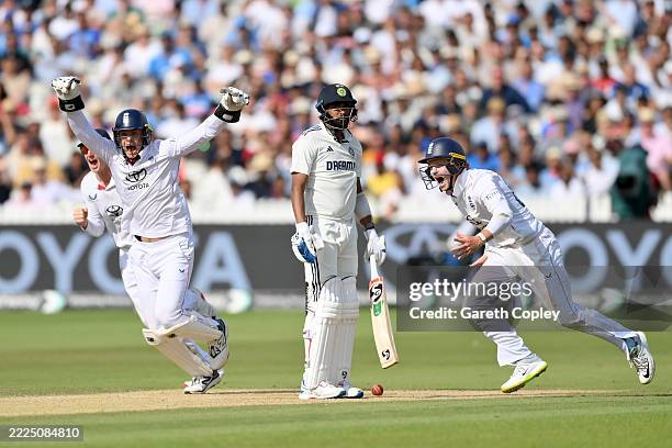 Harry Brook, Jamie Smith and Ollie Pope of England celebrate after Mohammed Siraj of India bowled to winthe 3rd Rothesay Test Match between England...