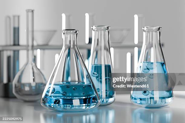 3d rendering of laboratory glassware with blue liquid for scientific research - beaker stock illustrations