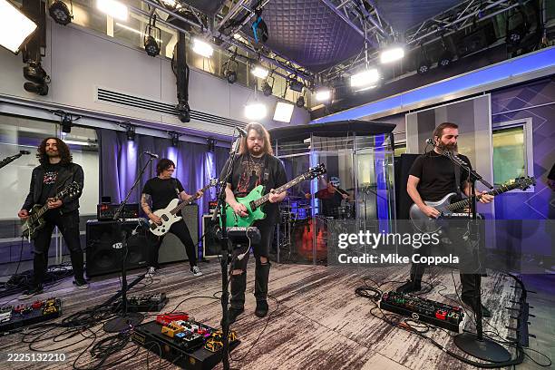 Frank Sidoris, Ronnie Ficarro, Wolfgang Van Halen, Garrett Whitlock, and Jon Jourdan of the band Mammoth perform during their visit to SiriusXM...