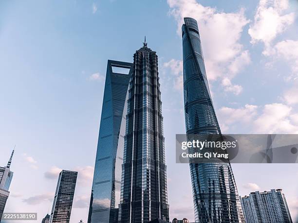 skyscrapers towering into the sky, shanghai, china - monopoly hotel stock pictures, royalty-free photos & images