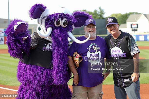 Mascot of the Erie Moon Mammoths Fuzz E Mammoth, George Moon and John Oliver pose for a photo prior to the game between the Chesapeake Baysox and the...