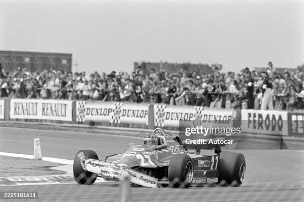 Gilles Villeneuve attempts to drive his damaged Ferrari 126CK back to the pit lane after getting caught up in a crash during the British GP,...