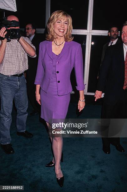 American media personality Leeza Gibbons, wearing a purple suit, attends the 36th Annual National Association of Television Program Executives...