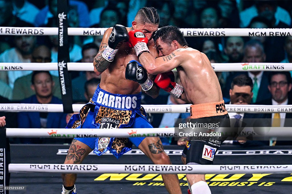 Boxing Mario Rios Manny Pacquiao and Mario Barrios exchange punches during their WBC ...