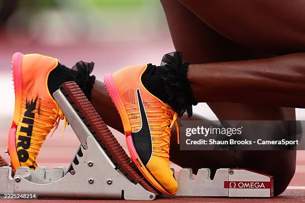 Detail view of the Puma evospeed Nitro Elite running spikes worn by Andrenette Knight in the starting blocks before the women's 400m hurdles during...