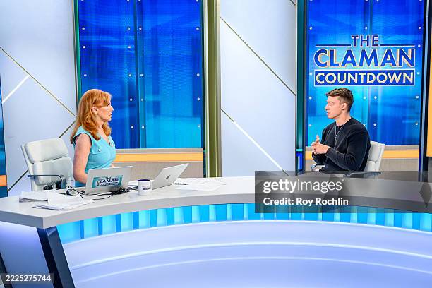 Host Liz Claman and School Of Hard Knocks Co-Founder and Influencer James Dumoulin during "The Claman Countdown" at Fox Business Network Studios on...