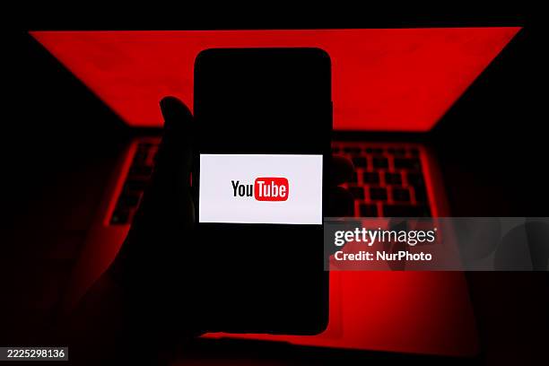YouTube logo is displayed on a mobile phone screen for illustration photo. Gliwice, Poland on July 20th, 2025.