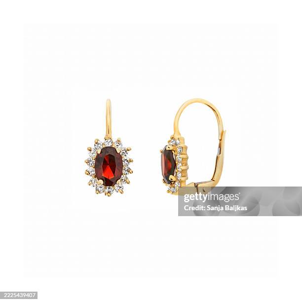 gold earrings with a red ruby - earring stock pictures, royalty-free photos & images