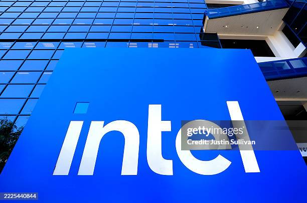 The Intel logo is displayed on a sign in front of Intel headquarters on July 16, 2025 in Santa Clara, California. Intel is laying off nearly 4,000...