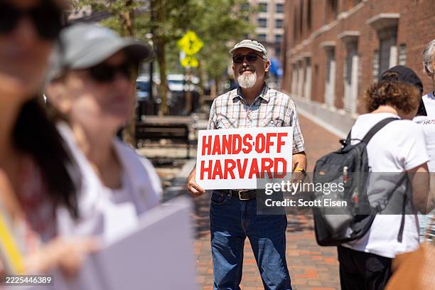 Protestors gather outside the John Joseph Moakley United States Courthouse on July 21, 2025 in Boston, Massachusetts. Lawyers for Harvard University...