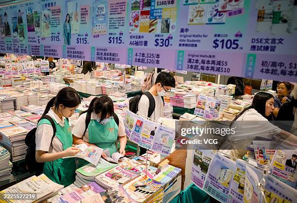 People select books during the 35th Hong Kong Book Fair at the Hong Kong Convention and Exhibition Centre on July 16, 2025 in Hong Kong, China. The...