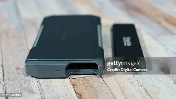 Close up of a SanDisk Professional Pro Blade solid state drive storage device.