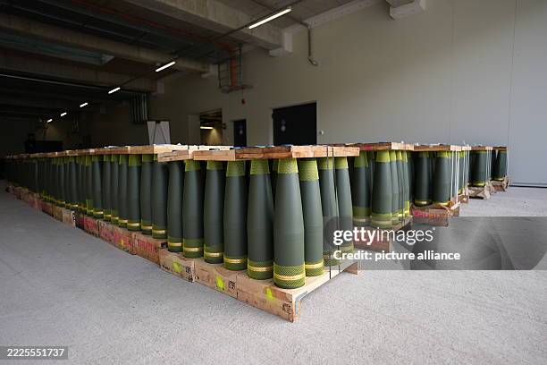 July 2025, Lower Saxony, Unterlüß: Artillery shells of 155 mm caliber are lined up in the new ammunition factory LAP of the armaments company...