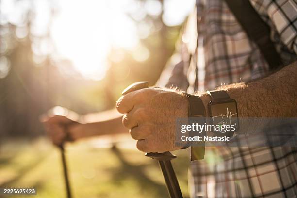 fitness tracking on the trail - fitness tracker stock pictures, royalty-free photos & images