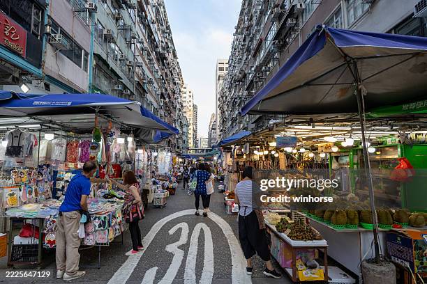 street market in mong kok, kowloon, hong kong - asian market stock pictures, royalty-free photos & images
