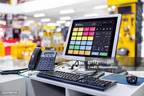 cash register at a hardware store - caixa registadora imagens e fotografias de stock