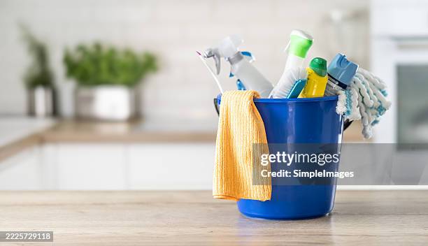 cleaning, products and house service with container tools or chemical liquid cleaner in house, home interior. service work, spring clean or housekeeping with plastic bottle, spray and brush - attrezzi per le pulizie foto e immagini stock